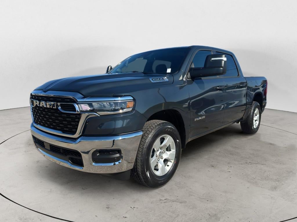 2026 RAM Ram 1500 RAM 1500 TRADESMAN CREW CAB 4X4 5'7' BOX in Forged Blue Metallic Exterior Paint — front three-quarter view