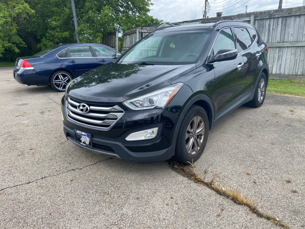 2016 Hyundai Santa Fe Sport 2.4L in Twilight Black — front three-quarter view